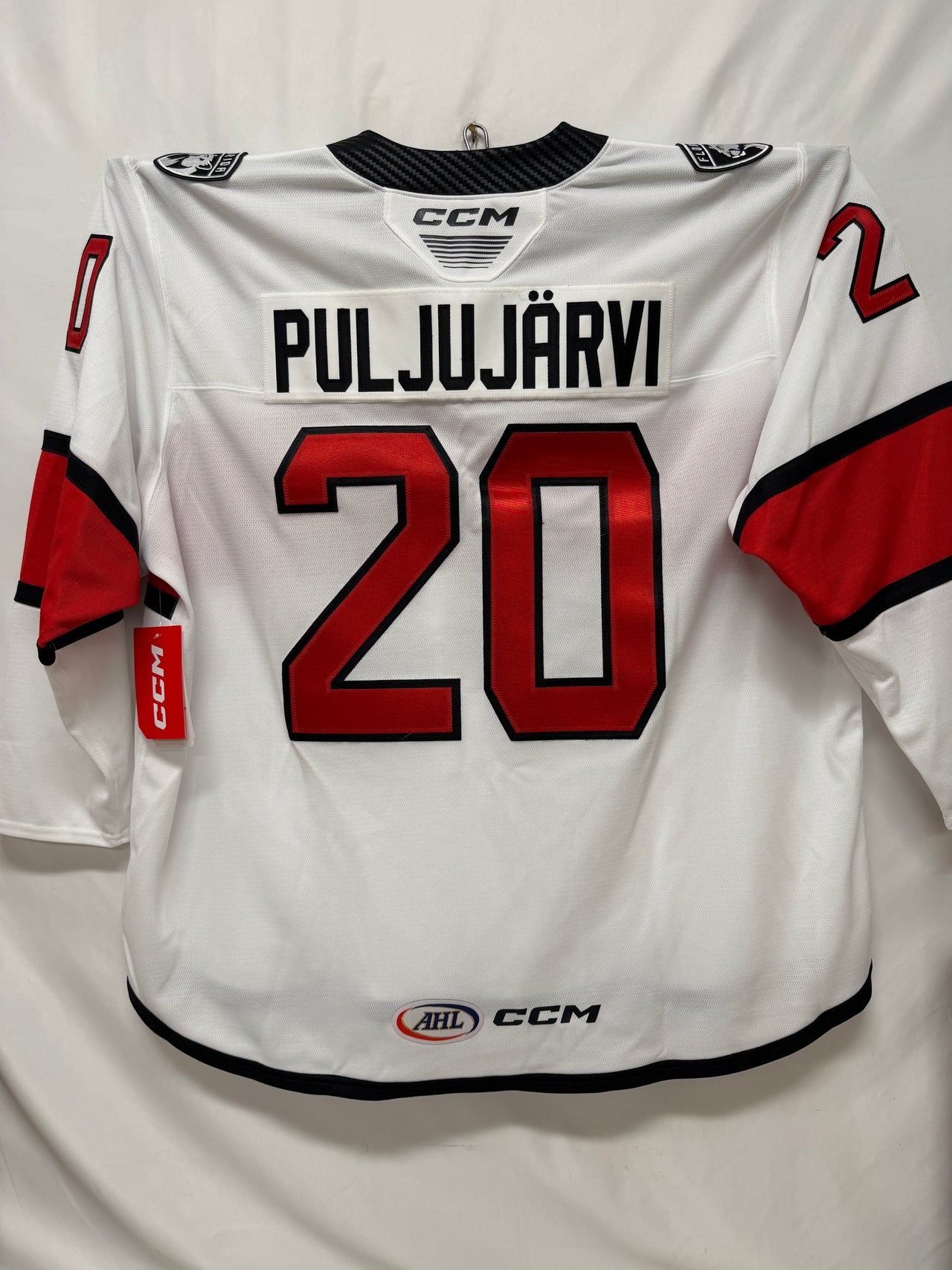 CCM Quicklite Charlotte Checkers Premier White Jersey - PULJUJARVI #20