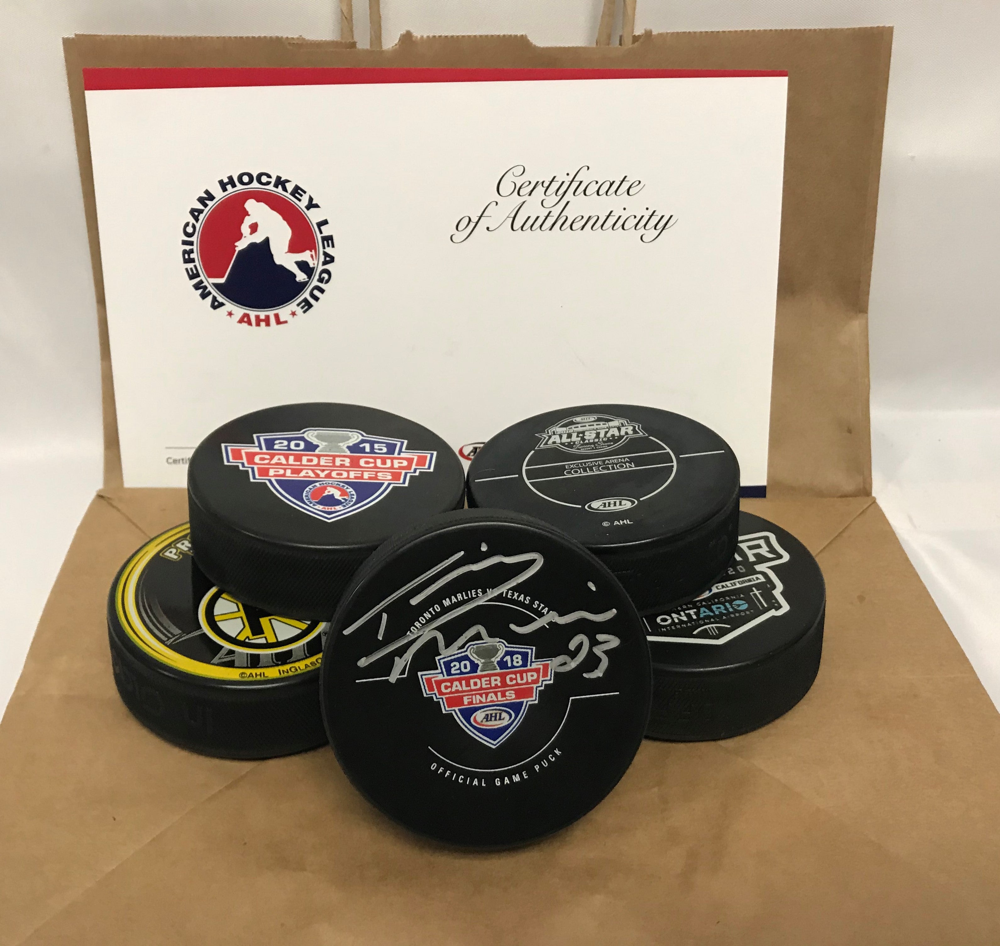 Springfield Falcons AHL Hockey Puck Lot - 2 Pucks You Get Both